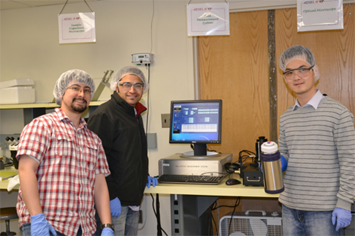 Yan, Nikhil and Mike are performing temperature dependent Hall measurement.